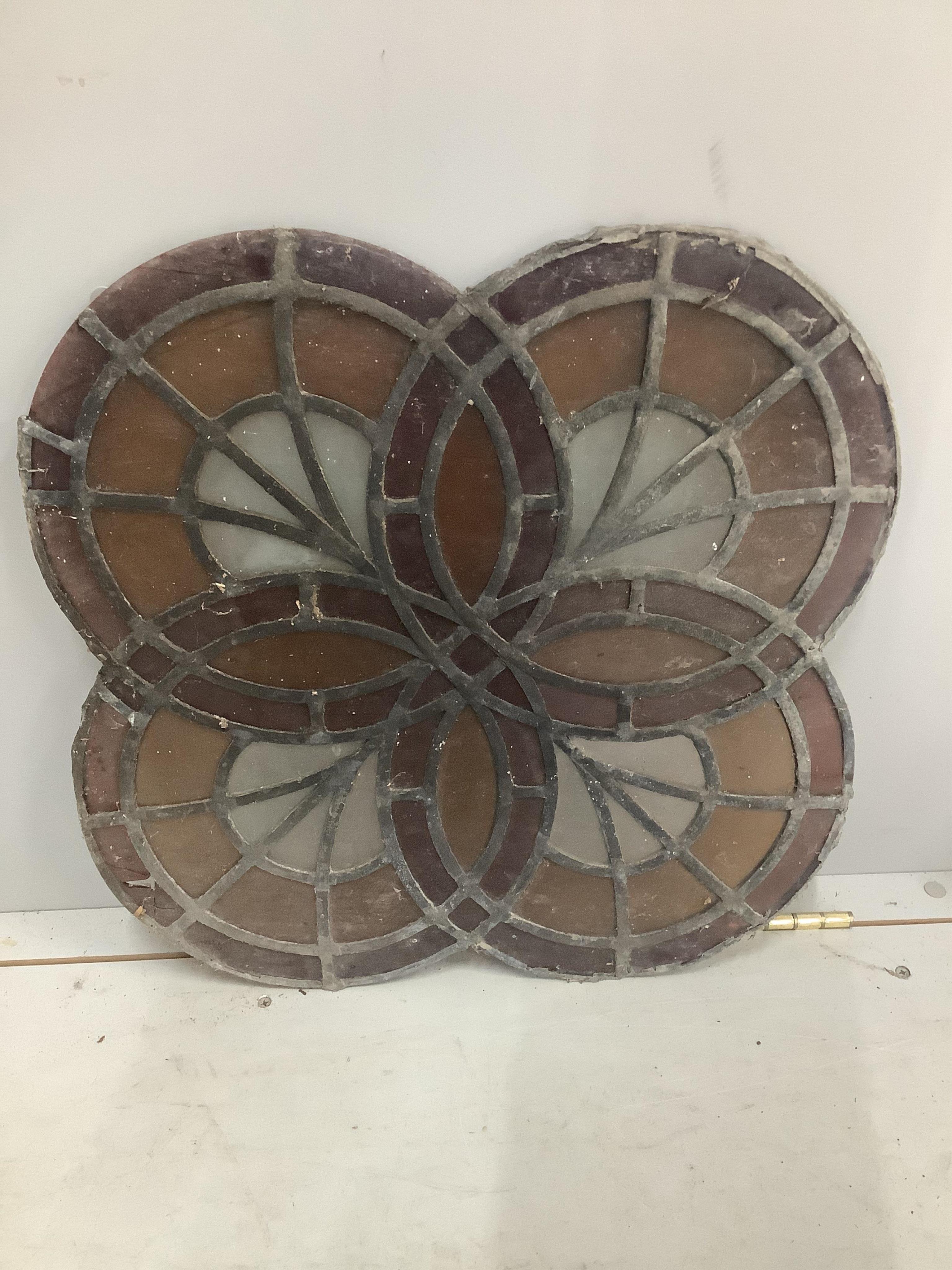 A set of three stained glass panels, 50 x 50cm. Condition - one section of glass missing and some leading missing